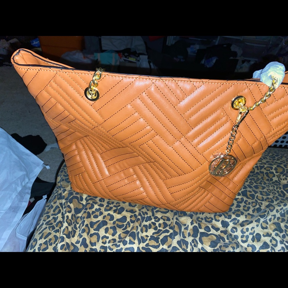 This is a beautiful new bag I just have to many of these bags